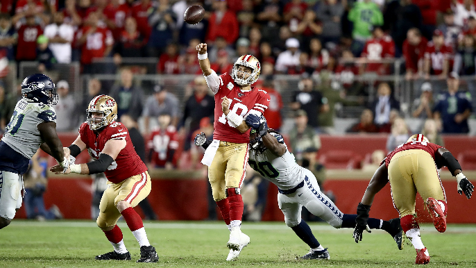 49ers can’t overcome injury pileup, dealt first loss by Seahawks in wild overtime game