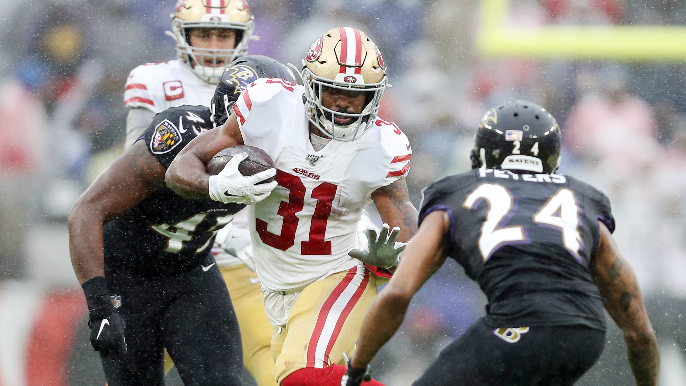 Running in the rain: Ravens outlast 49ers in ground game slugfest